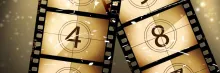 Two film strips, one with the number 4 and one with the number 8